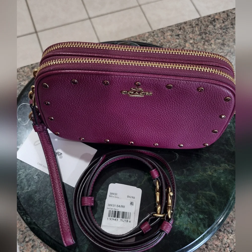 NWT Coach Cristal Border Rivets Dark Berry Crossbody / Clutch in Pebble …
